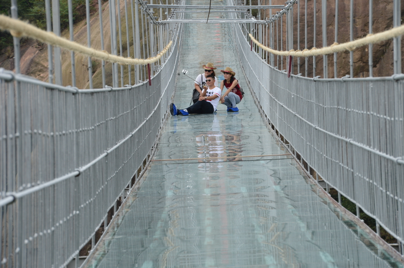 Illustration for article titled The Longest Glass Bridge on Earth Caters to Tourists Who Like Being Scared Silly